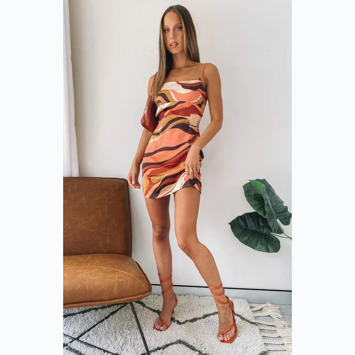 Ladies mini dress with seductive wrap design and intense color gradient Lune London