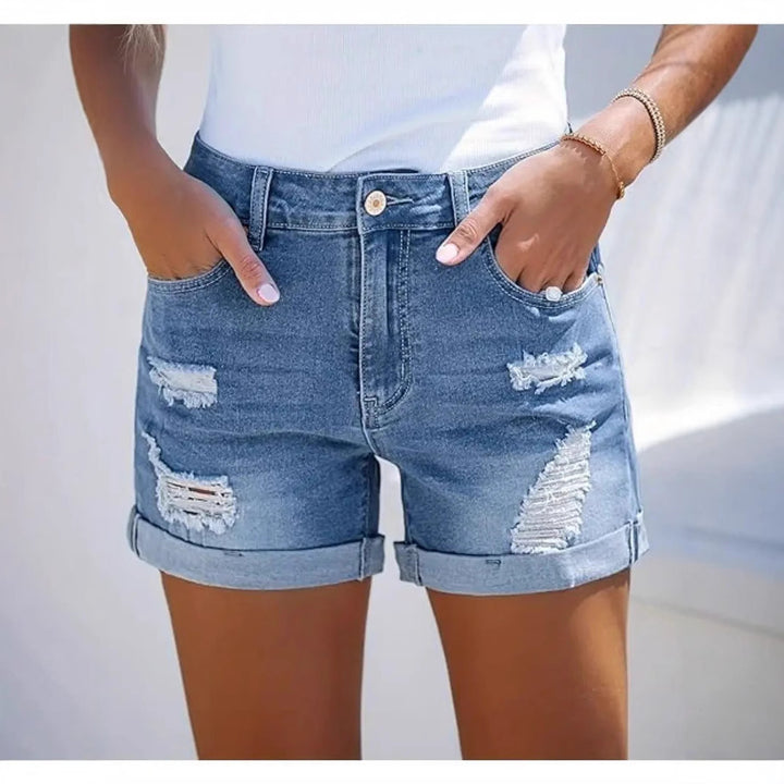 Women's short destroyed denim shorts in a casual look with rolled hems and stylish tear details Lisslune