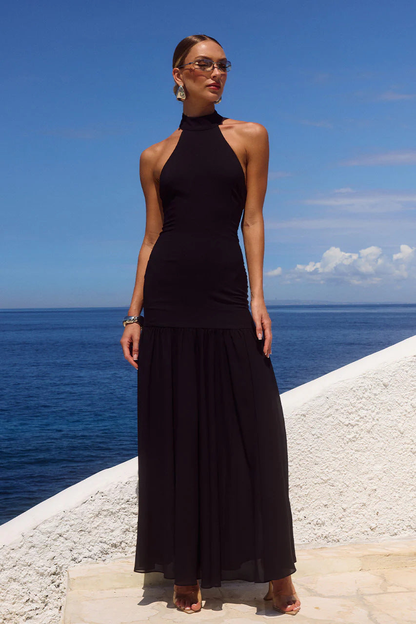 Women's maxi dress with high-neck design and flowing skirt