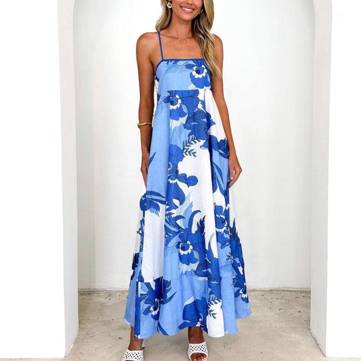 Women's maxi dress with playful floral design and cut-out details