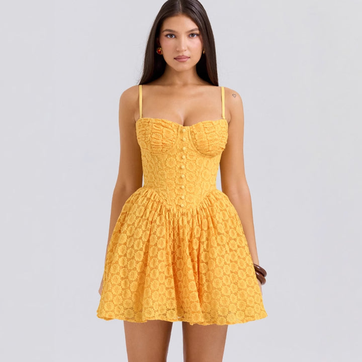 Ladies summery bustier dress with playful ruffles and refined button details