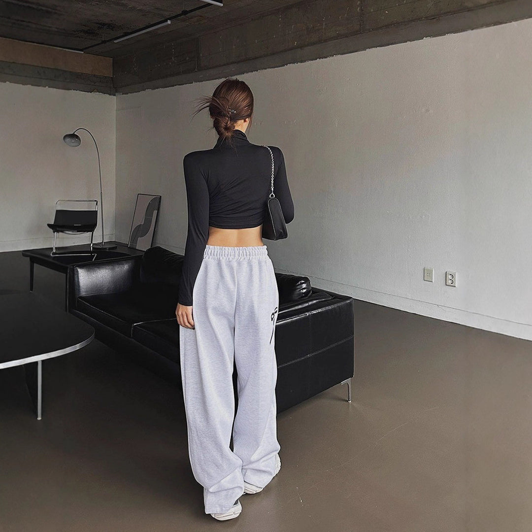 Women's loose leisure pants with elastic waistband and decorative bow motif Lisslune