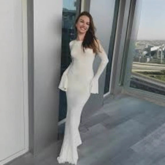 Women's form-fitting long dress with stylish shell design and elegant sleeve finish