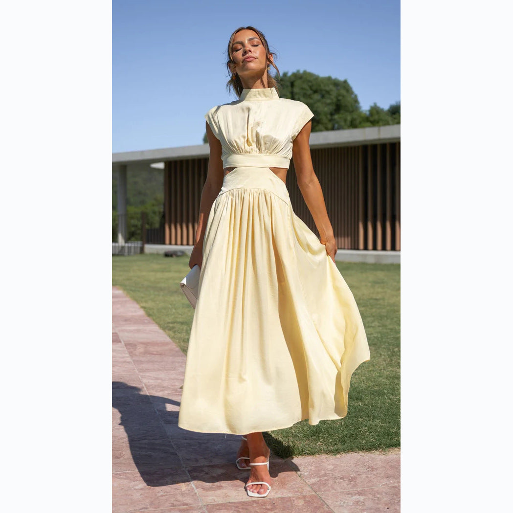 Ladies max dress with creative cut and fitted design