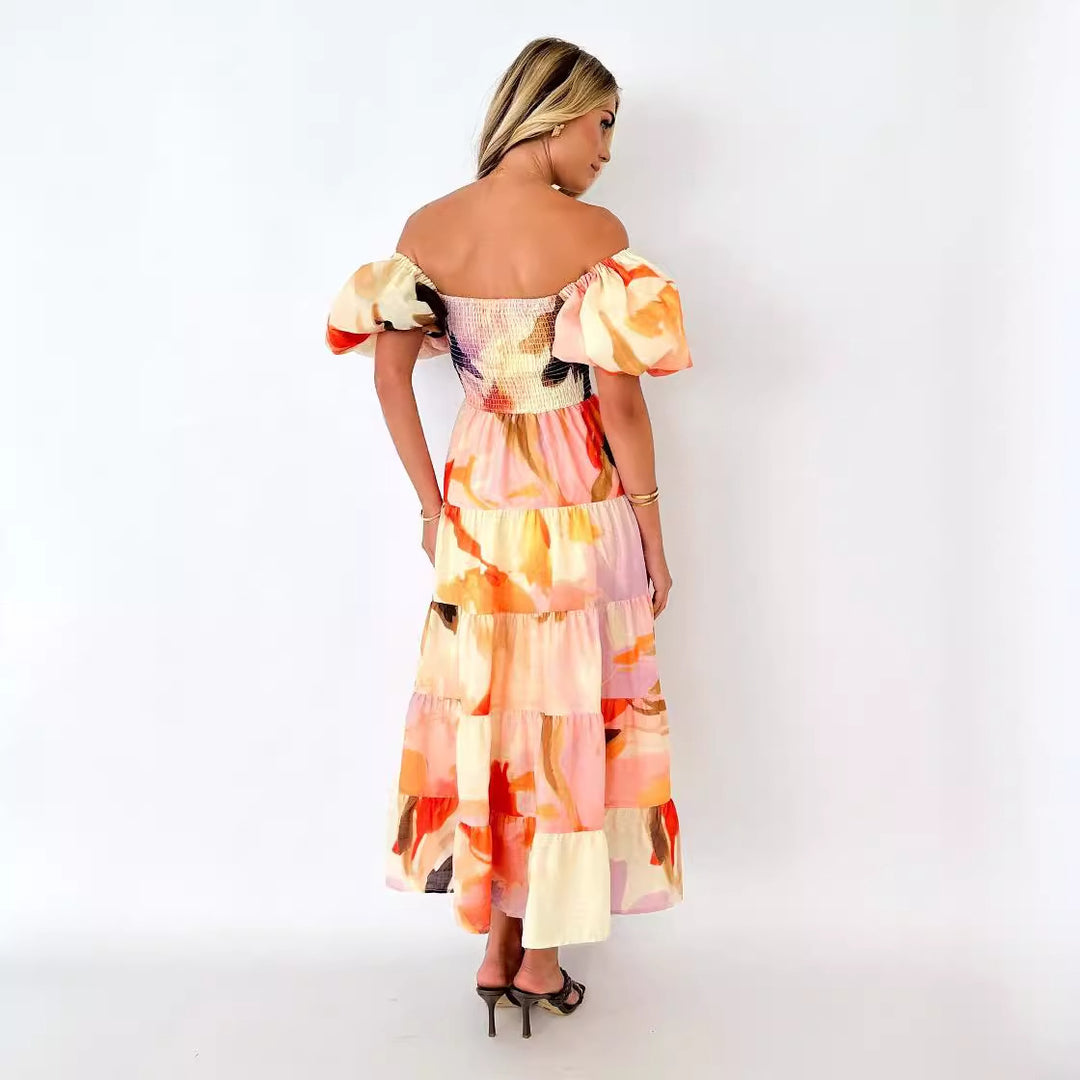 Women's maxi dress with puff sleeves and floral smocking