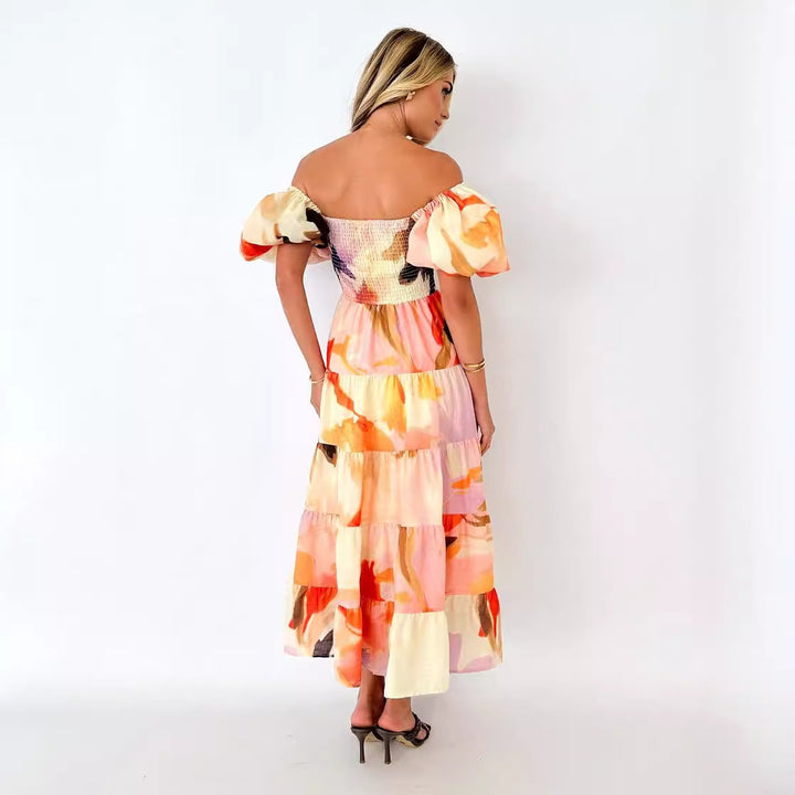 Women's maxi dress with puff sleeves and floral smocking