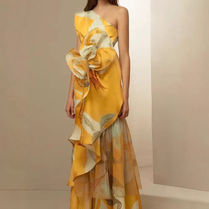 Women's elegant asymmetrical evening dress with flowing skirt and eye-catching ruffle details