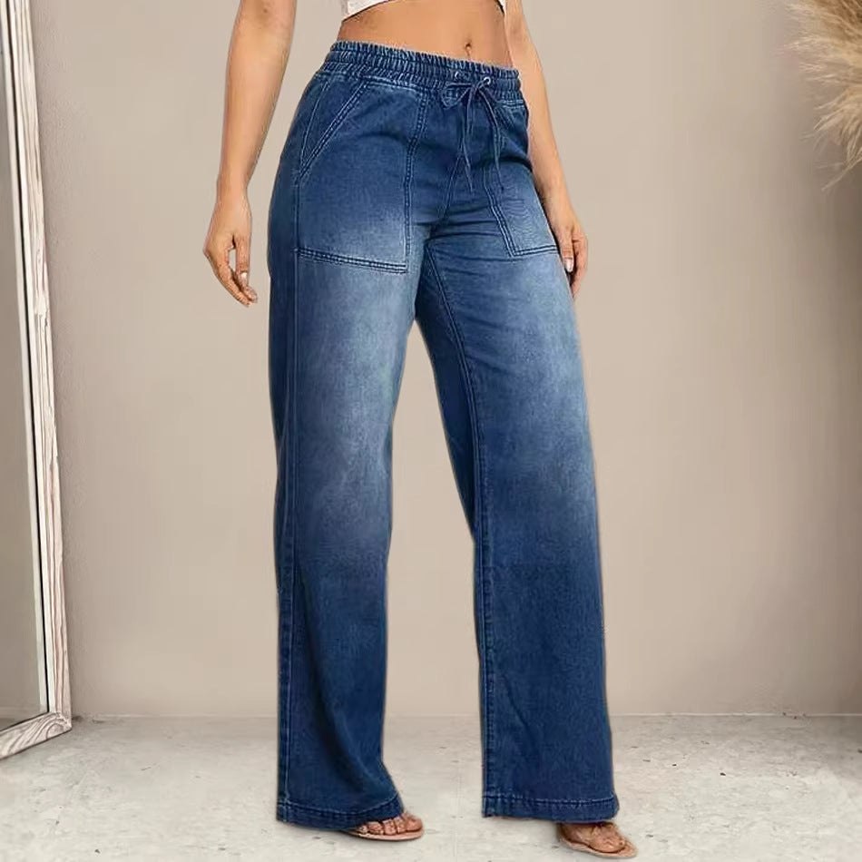 Women's wide-cut jeans with elastic waistband and trendy used look