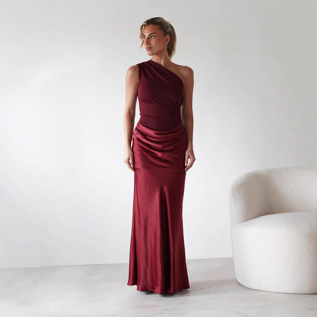 Women’s evening dress with asymmetrical cut and elegant draping design