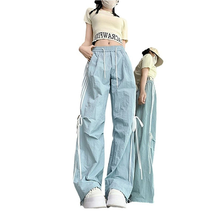 Women’s casual sports pants with side stripes and comfortable drawstring waistband