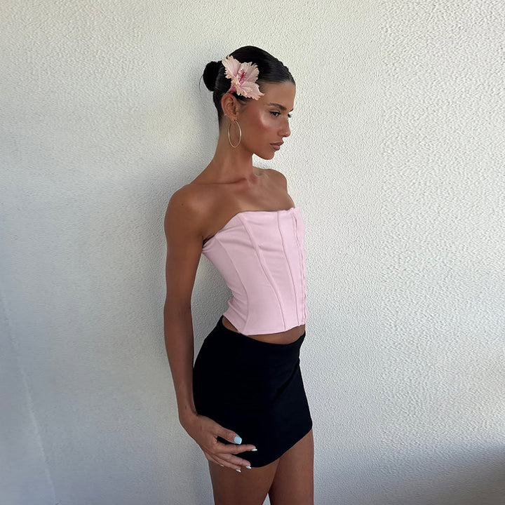 Women's corset top with elegant zip design and fitted silhouette