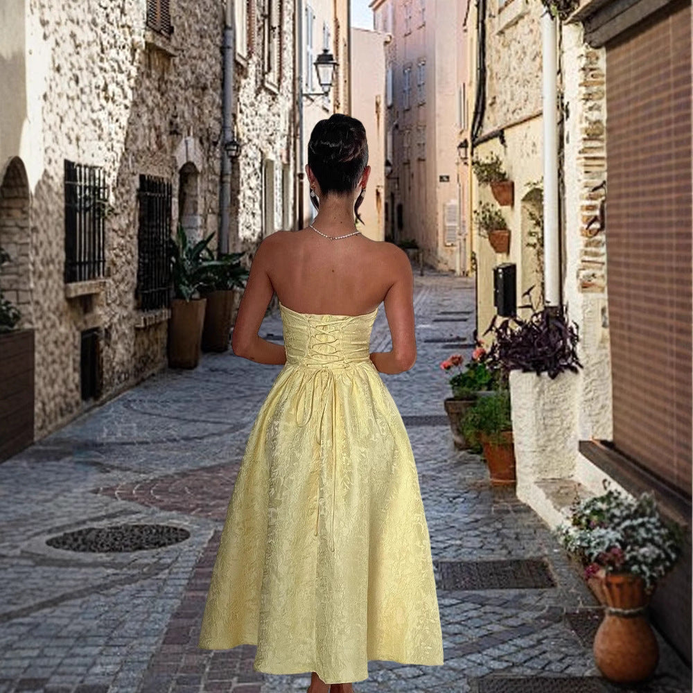 Ladies cocktail dress with elegant bustier top and flared skirt