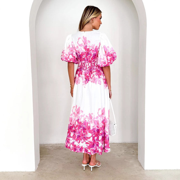 Women's maxi dress with voluminous puff sleeves and flowing cut