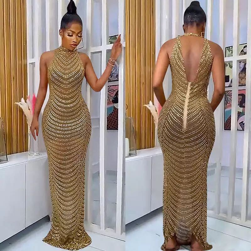 Ladies Glamorous Sequin Maxi Dress with Fitted Cut and Chic Back Cutout