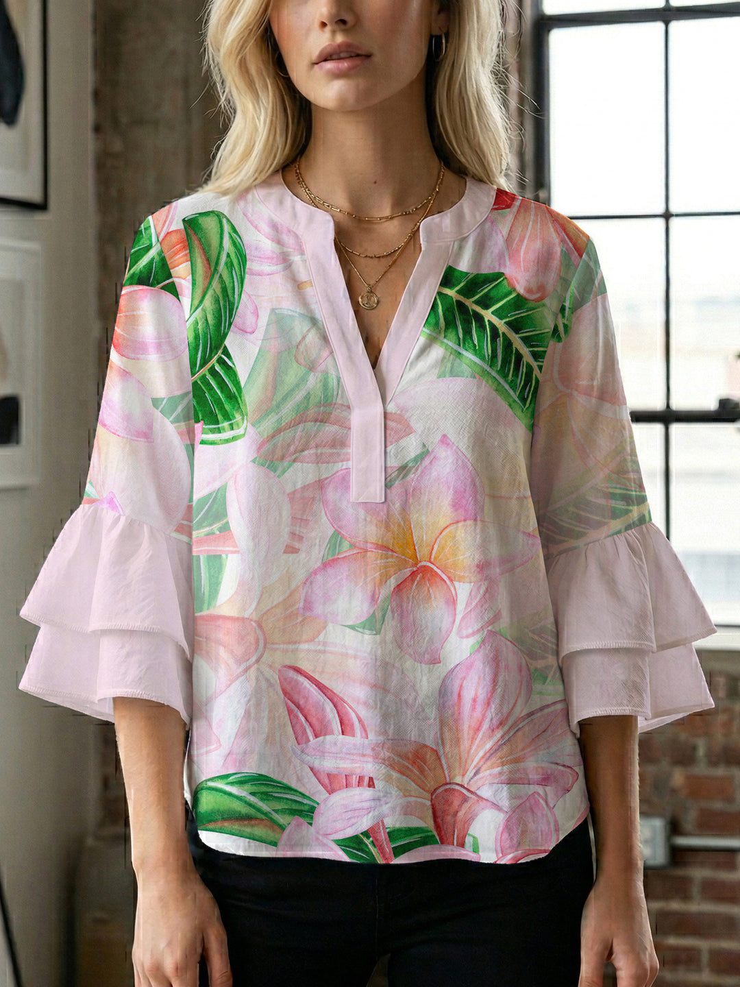Women’s blouse with voluminous ruffled sleeves and floral pattern Lisslune