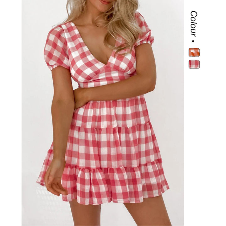 Women's casual dress with voluminous puff sleeves and playful hem Lune London