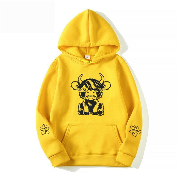 Women's hooded sweatshirt with charming cow motif and practical kangaroo pockets Lisslune