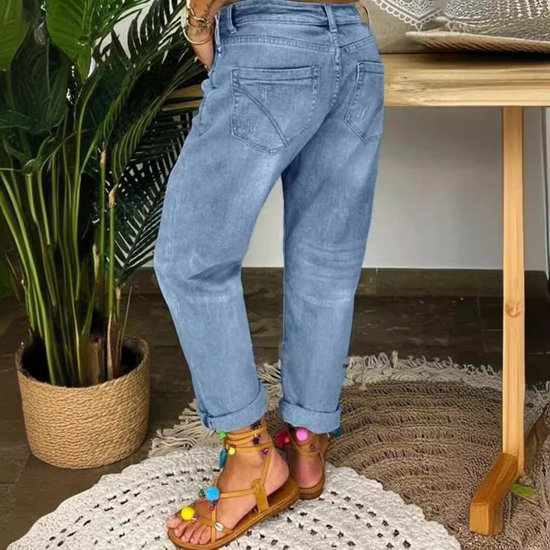 Women's Mom Jeans with button closure and stylish distressed details