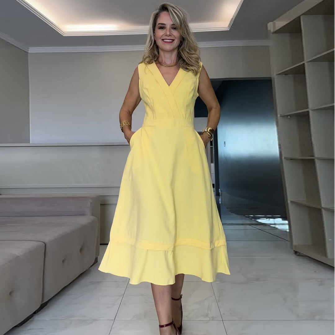 Women's midi dress with a flattering cut and practical pockets