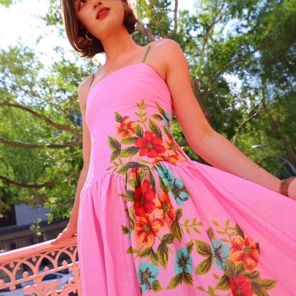 Women's maxi dress with floral draping design and ankle-bared straps