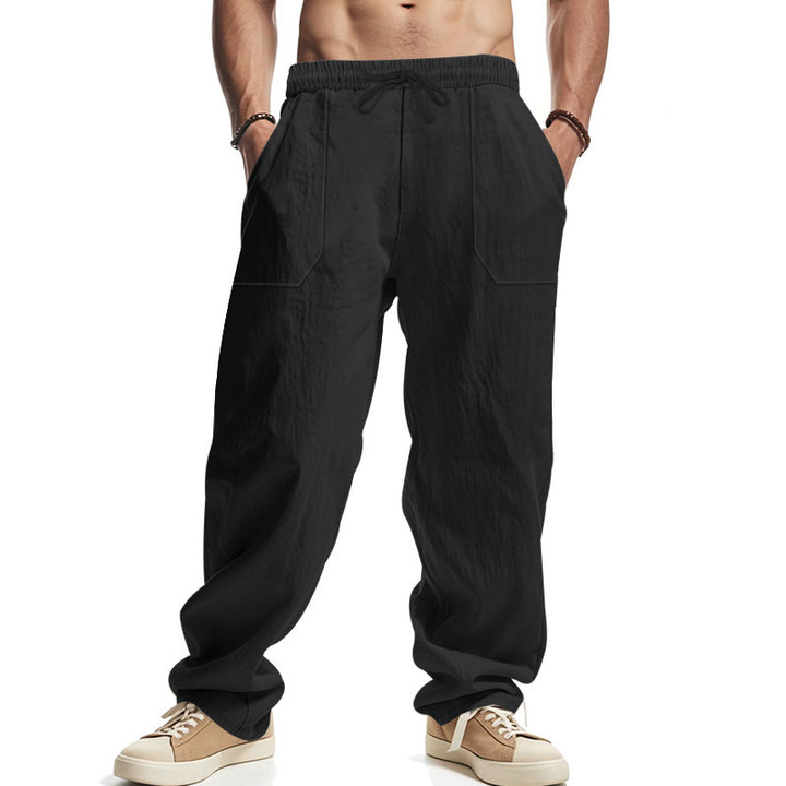 Men's loose cargo pants made of lightweight, breathable material with adjustable drawstring Lisslune