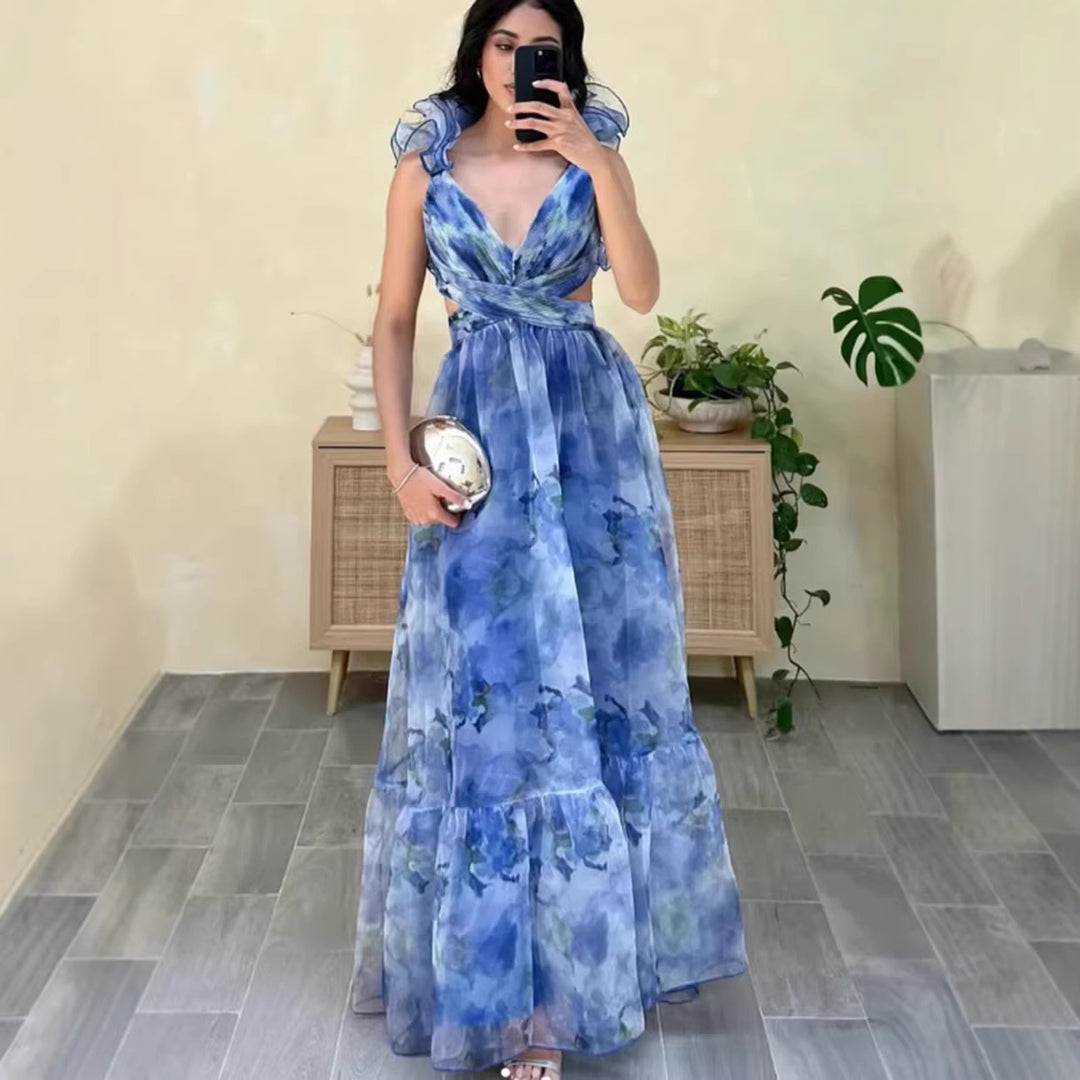 Women's maxi dress in romantic vintage style with a flowing skirt and ruffle details