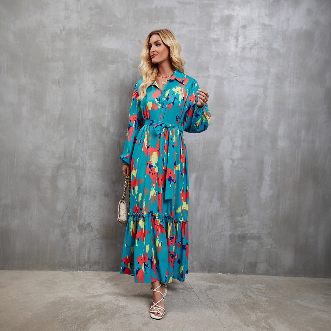 Women's maxi dress with colorful floral design and elegant waist belt
