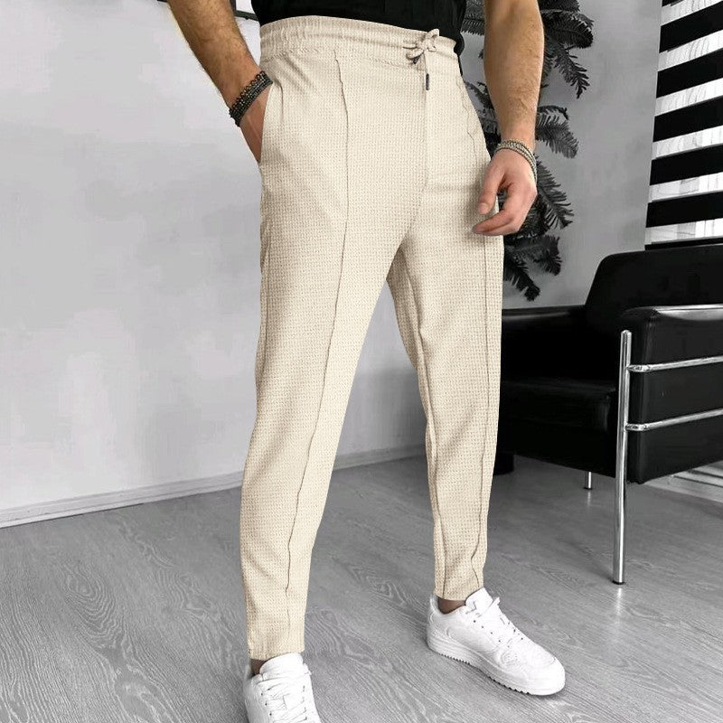 Men's stylish high-waisted pants with elastic drawstring and textured design Lisslune