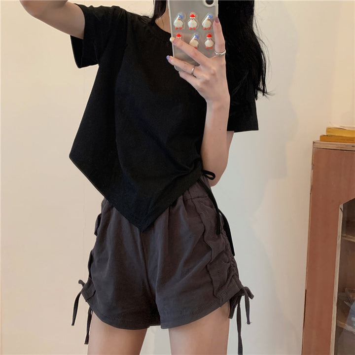 Women's crop top with asymmetric hem and loose fit