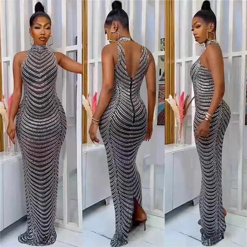 Ladies Glamorous Sequin Maxi Dress with Fitted Cut and Chic Back Cutout