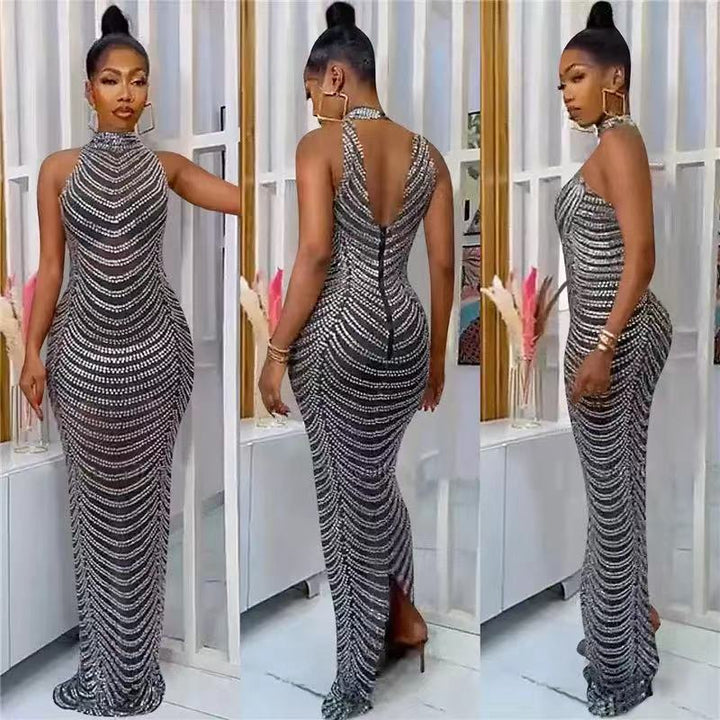 Ladies Glamorous Sequin Maxi Dress with Fitted Cut and Chic Back Cutout