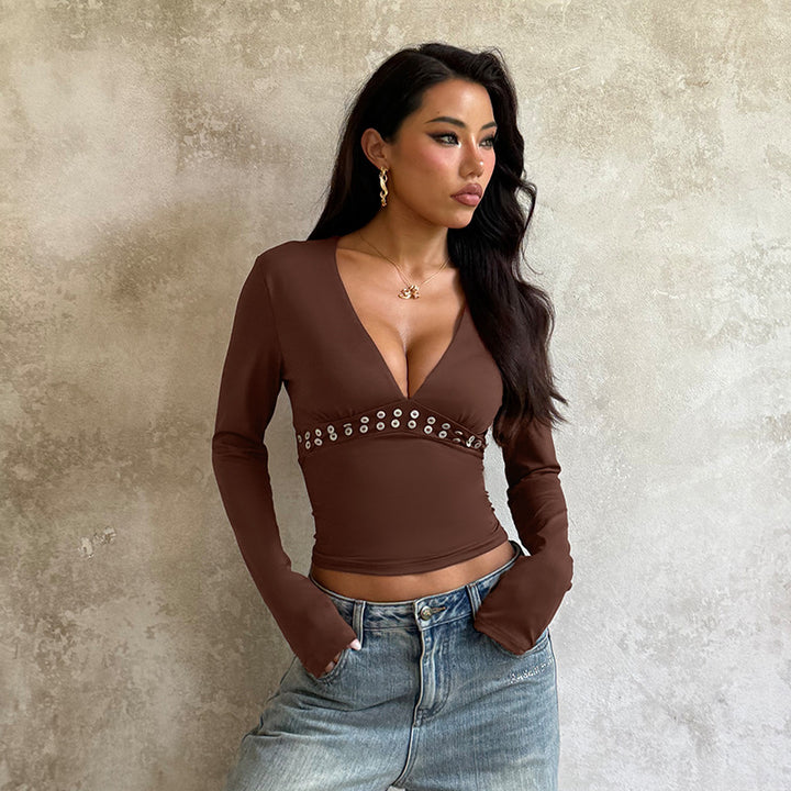 Women's long-sleeved top with a deep V-neckline and decorative metal accents Lune London