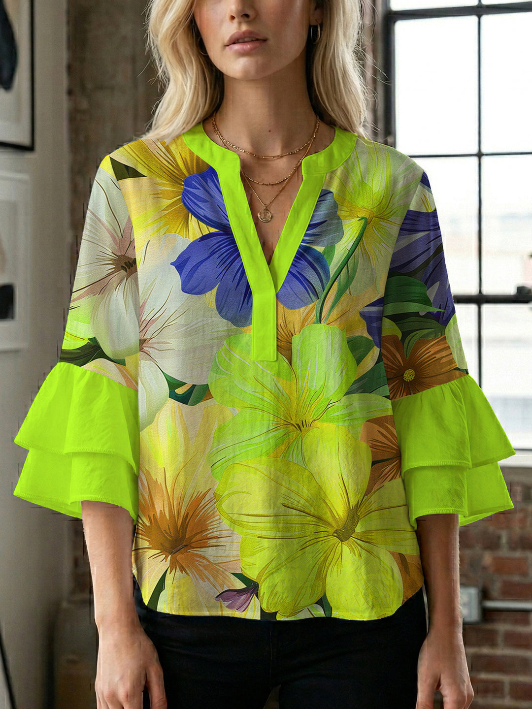 Women’s blouse with voluminous ruffled sleeves and floral pattern Lisslune