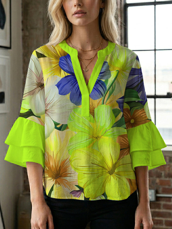 Women’s blouse with voluminous ruffled sleeves and floral pattern Lisslune
