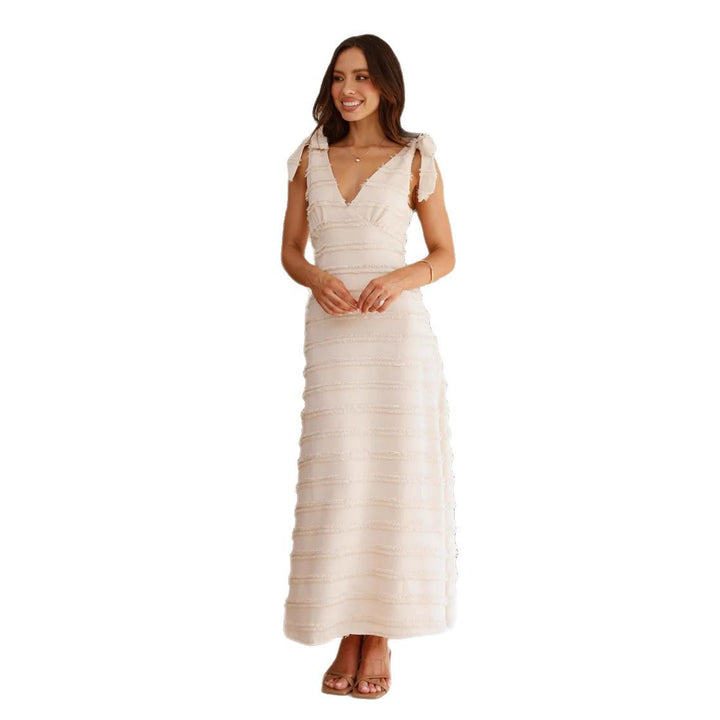 Ladies maxi dress with elegant draping design and ruffle accents