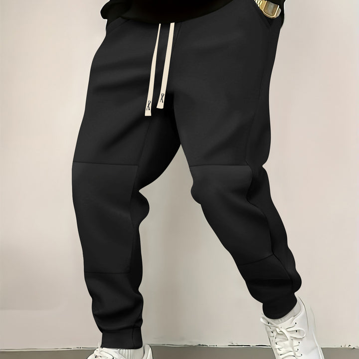 Men's elegant sports pants with modern color block elements Lisslune