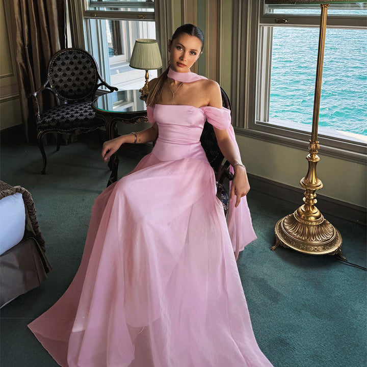 Women’s evening dress with off-shoulder design and elegant ruffle accents Lune London