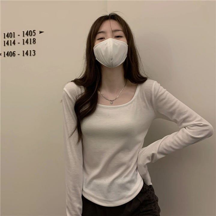 Women's long sleeve shirt with a stylish round neckline and fitted cut