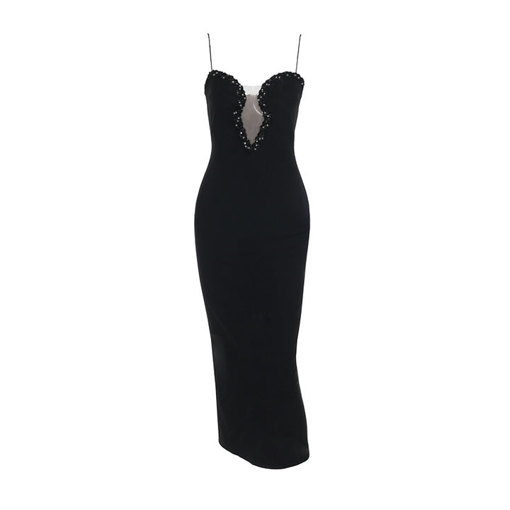 Women's evening dress with deep V-neckline and glamorous rhinestone details Lune London