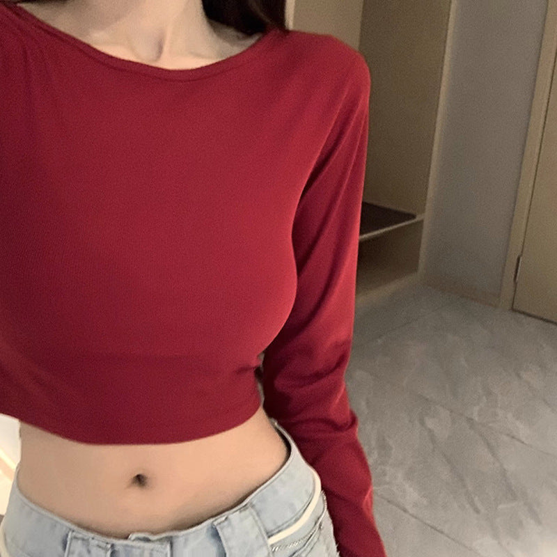 Women's long-sleeved crop top with criss-cross back and elegant V-neck