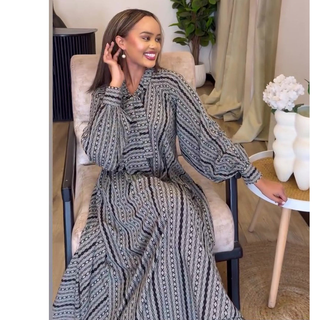 Ladies Maxi Dress with elegant ruffle sleeves and intricate pattern Lisslune
