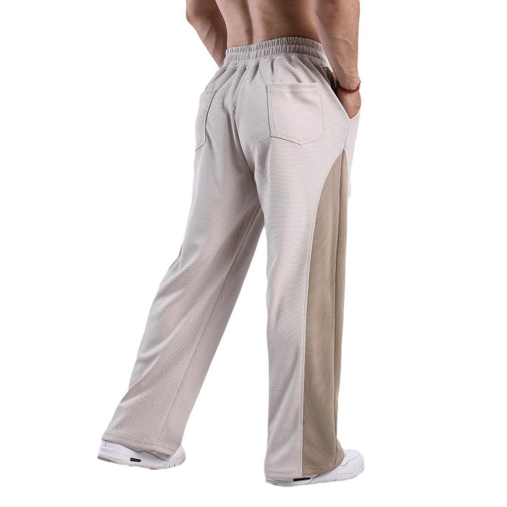 Men's sporty leisure pants with side ventilation openings and elastic waistband Lisslune