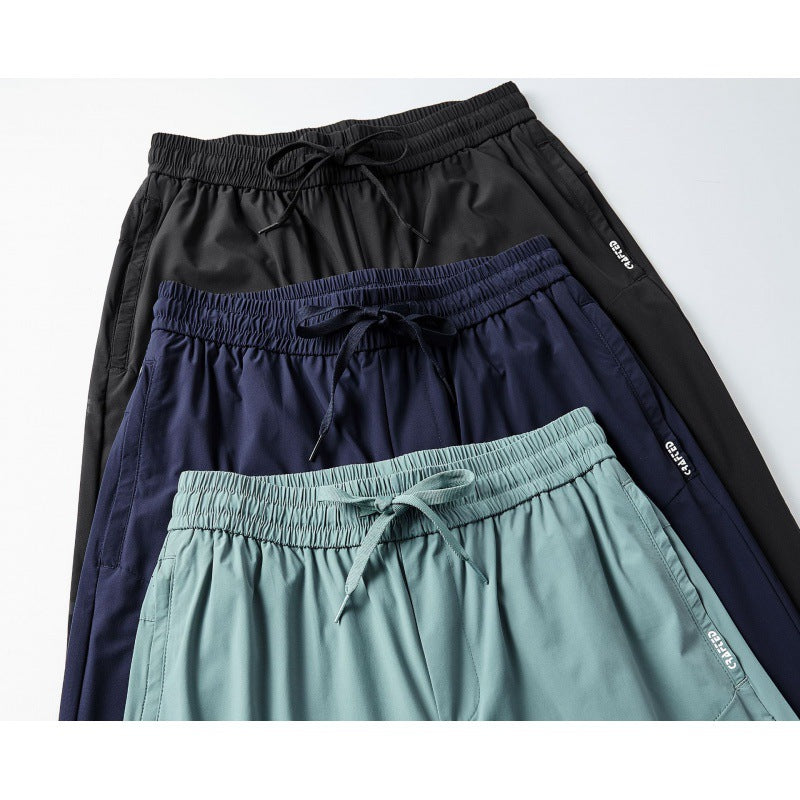 Men's casual sports pants with elastic waistband and practical side pockets Lisslune