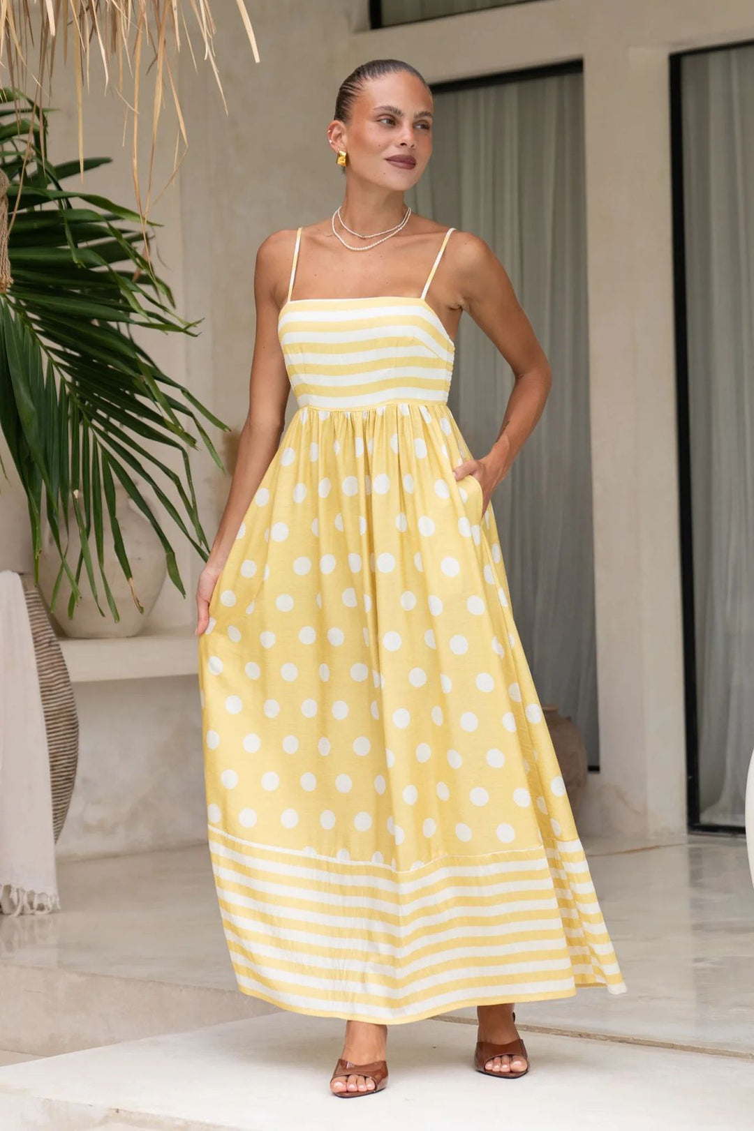 Women's maxi dress with gathered bodice and playful polka dot and stripe pattern Lune London
