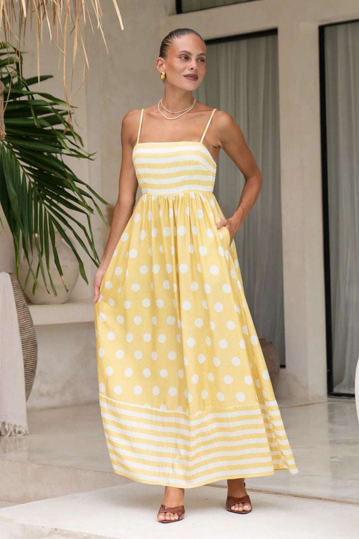 Women's maxi dress with gathered bodice and playful polka dot and stripe pattern Lune London