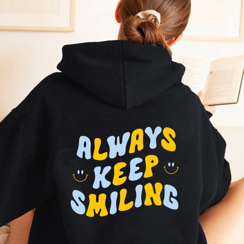 Ladies hoodie with cheerful lettering and practical kangaroo pockets Lisslune