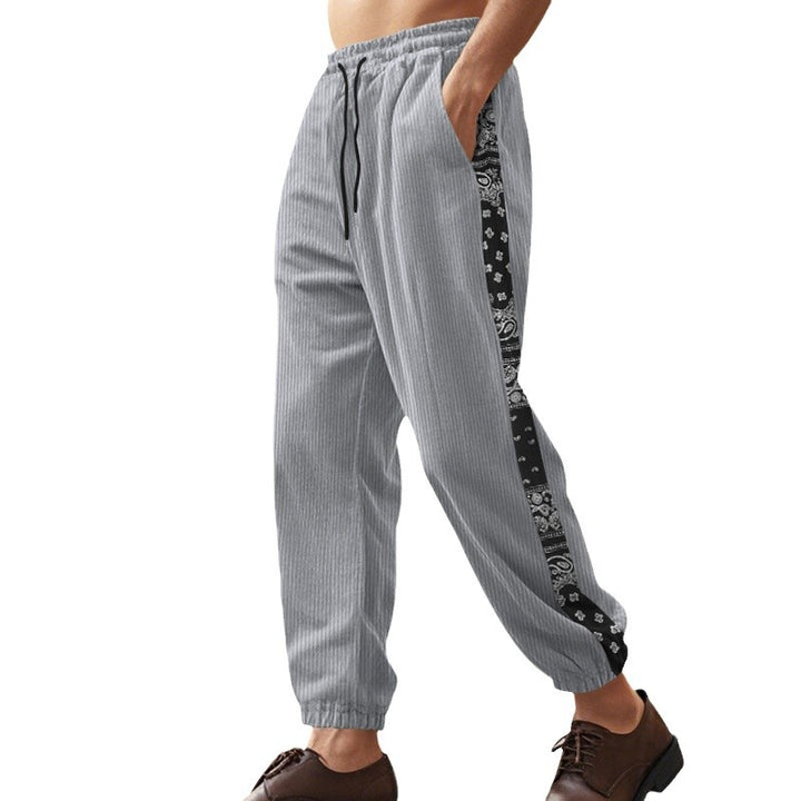 Men's relaxed leisure pants with elastic waistband and side pattern details Lisslune