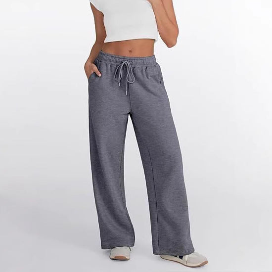 Women's loose leisure pants with elastic waistband and functional side pockets Lisslune