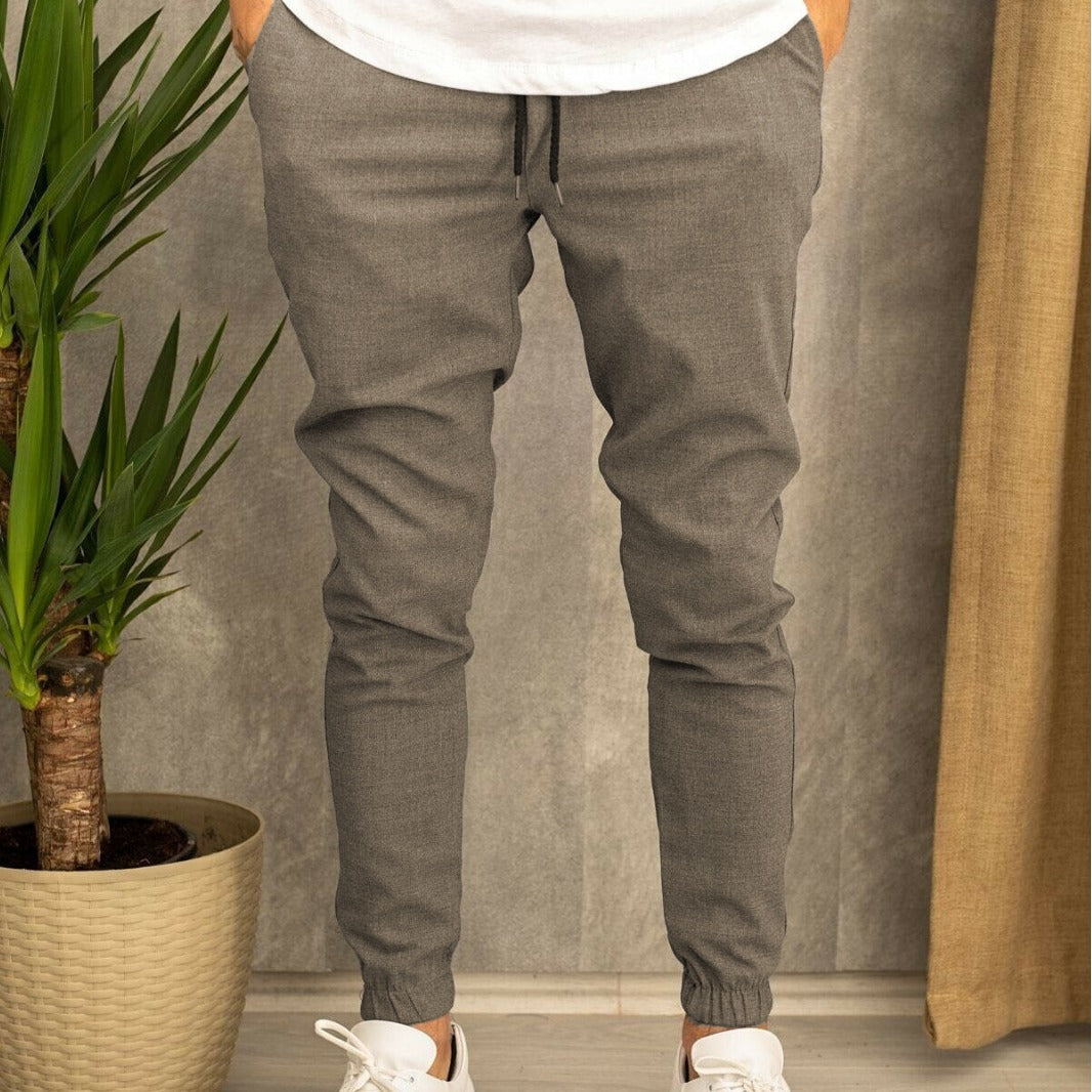Men's Slim-Fit Jogging Pants with Elastic Waistband and Practical Side Flap Pockets Lisslune