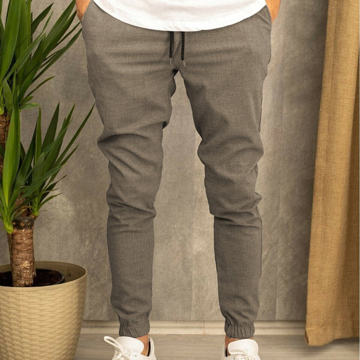 Men's Slim-Fit Jogging Pants with Elastic Waistband and Practical Side Flap Pockets Lisslune